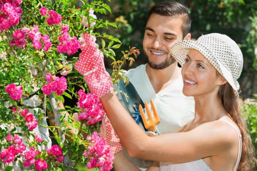 Professional landscapers working on a garden design